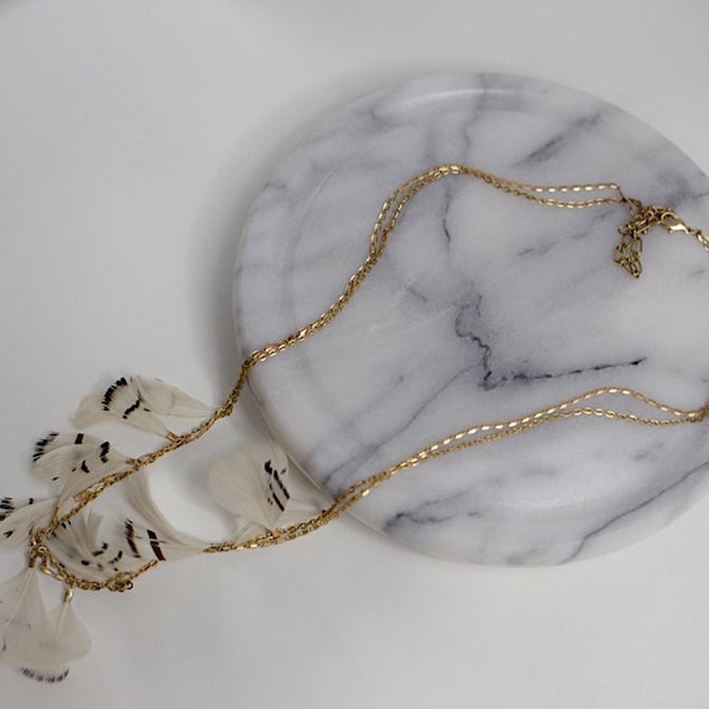Feathering gold double stranded necklace